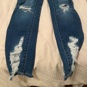 Distressed normal rise jeans